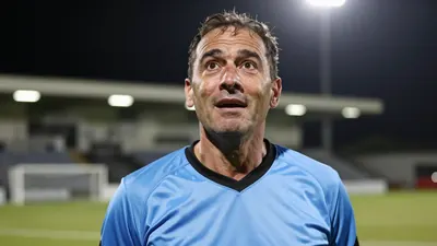 Glentoran defeated Ballymena United 2-0 on a night that saw captain Marcus Kane score on his 500th Irish League appearance